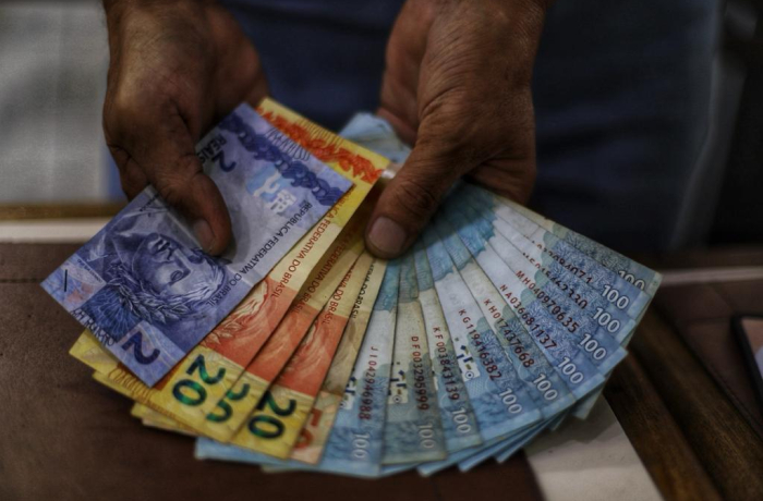Mercado financeiro prevê inflação menor, aumento do PIB e dólar mais barato